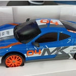 Model car with blue and orange design on a white background