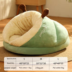 Pet bed shaped like a caterpillar with a size chart below on a wooden floor.