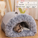 Cat sleeping in a gray pet bed with size and weight information displayed.