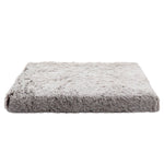 Gray fluffy pet bed on a white background